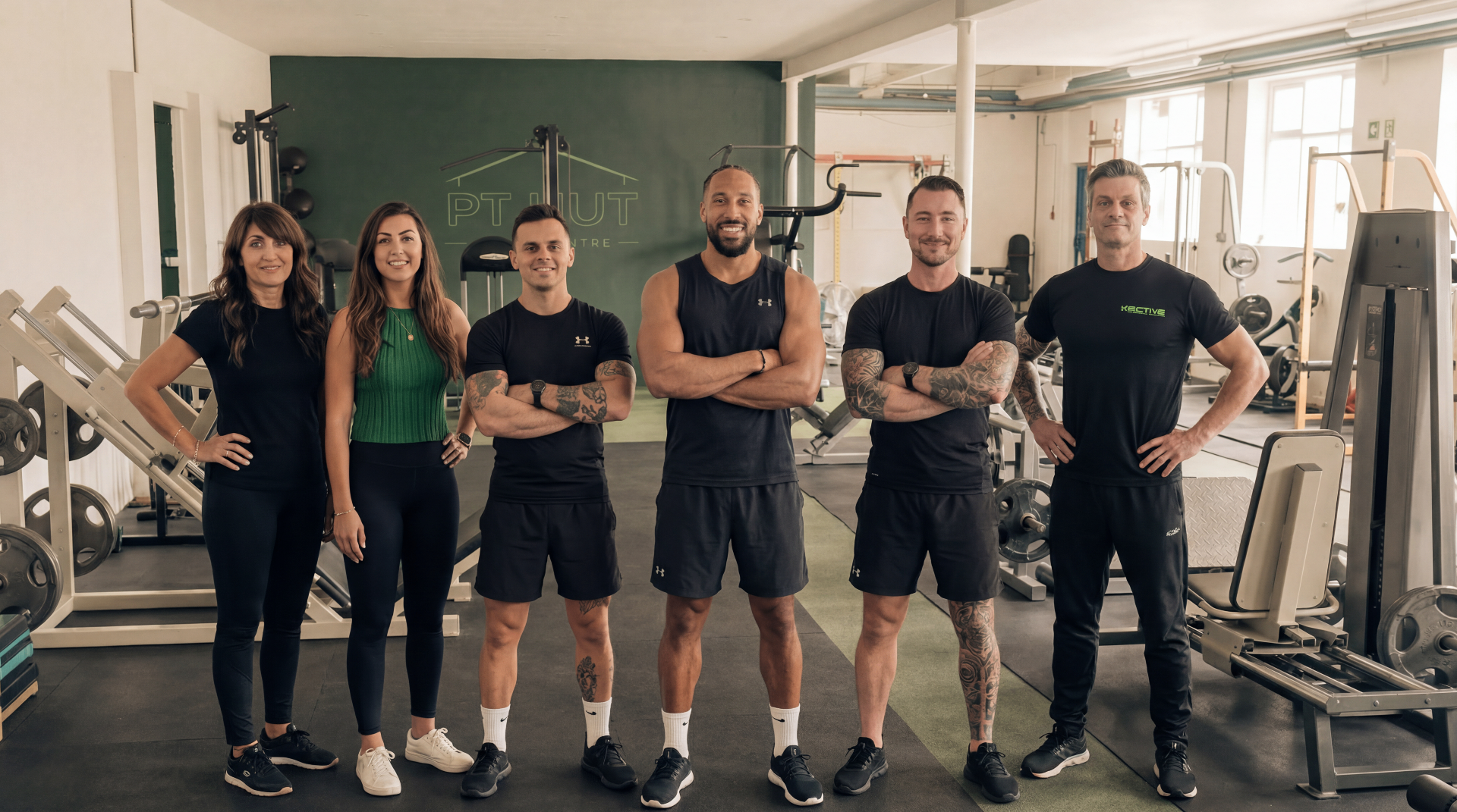 The PT Hut personal trainers — full team in the gym